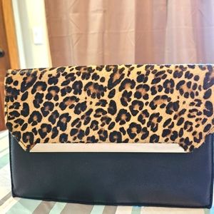 Silpada leather clutch.  Retired piece.